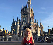 Happy Kid in Disneyland